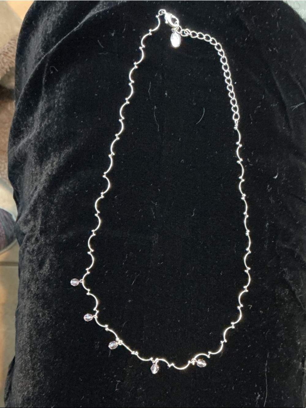Delicate Silver Wave Necklace with Crystal Drops